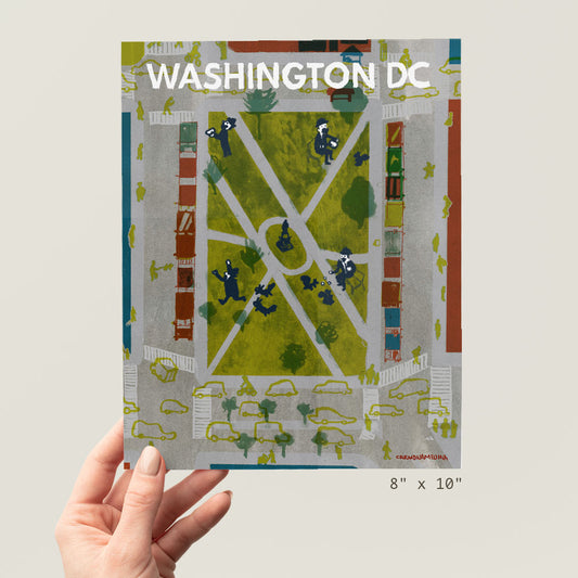 a person holding up a picture of a park