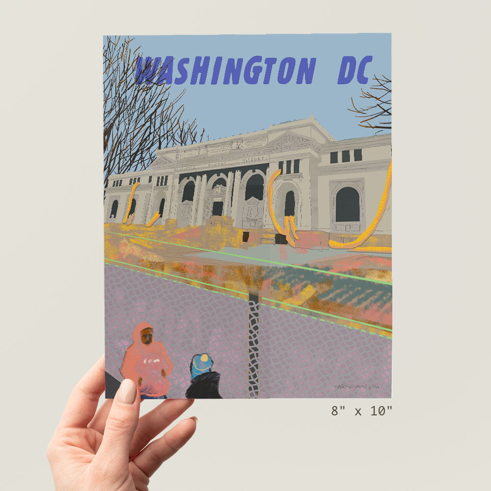 a person holding up a picture of washington dc