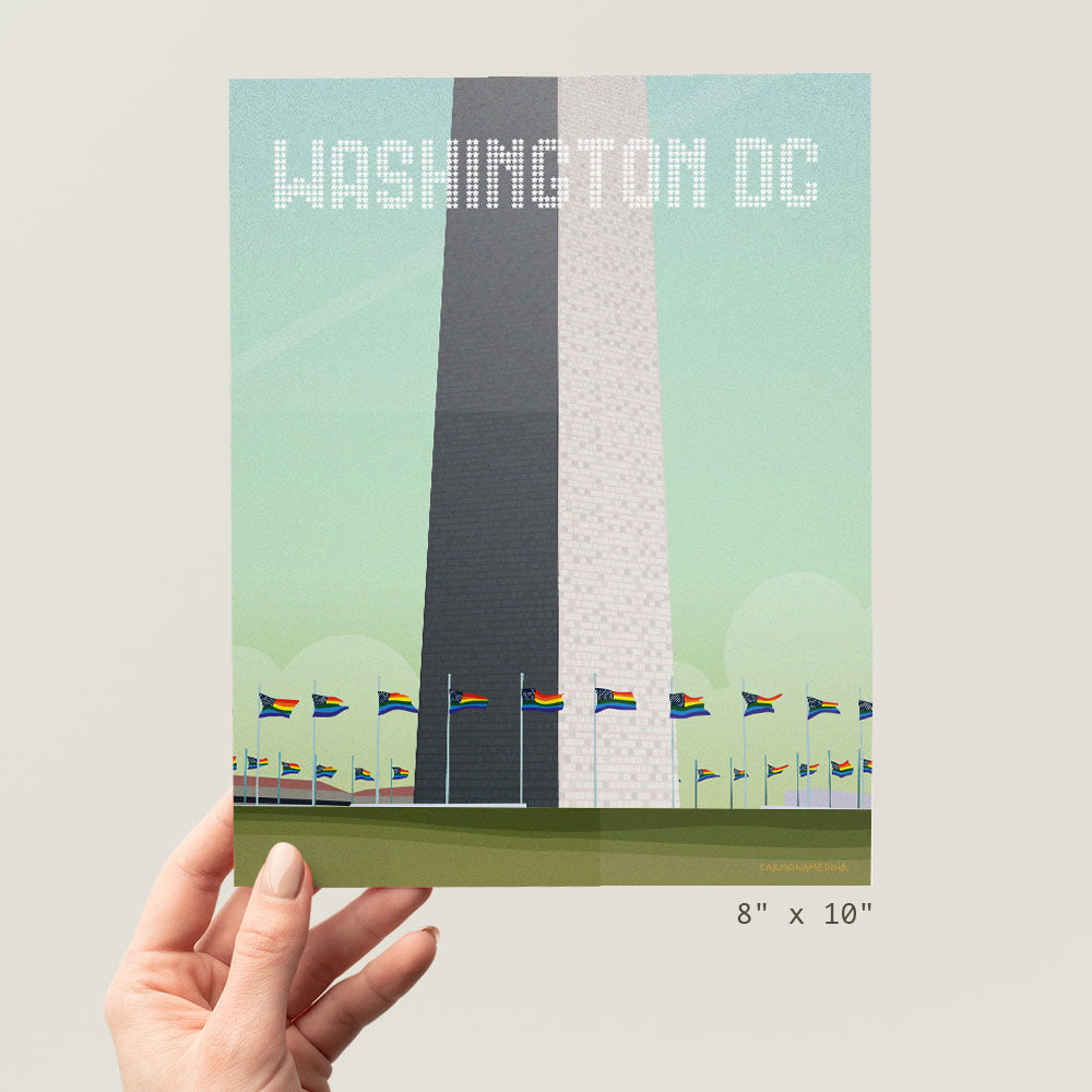 a hand holding up a poster of washington dc