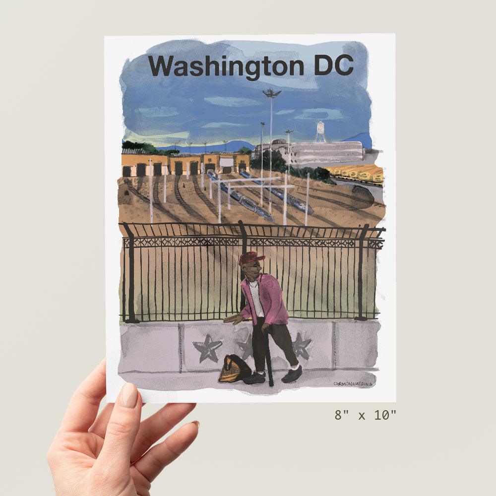 a person holding up a picture of washington dc