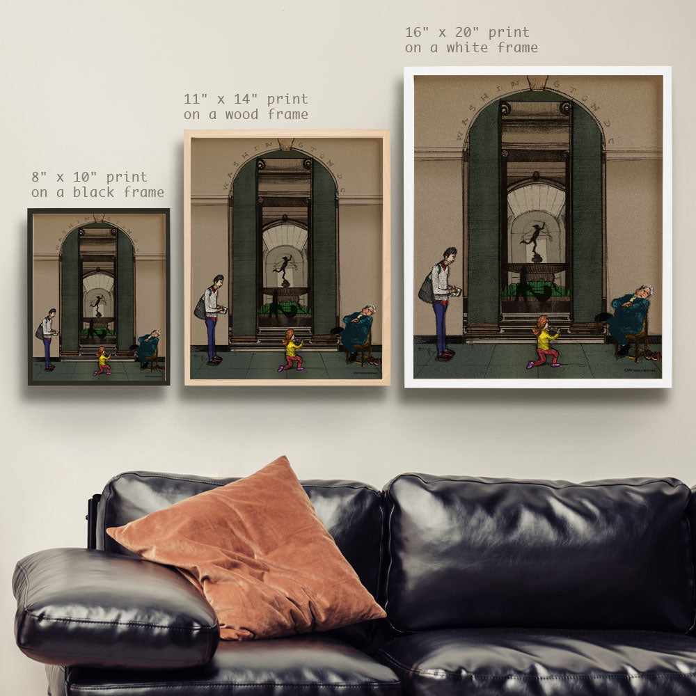 a living room with a couch and two pictures on the wall