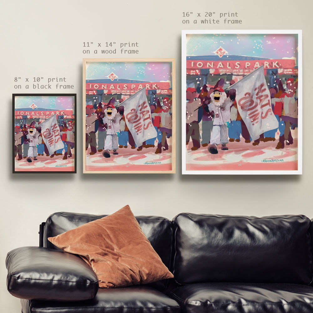 a couch with a black leather chair and two posters on the wall