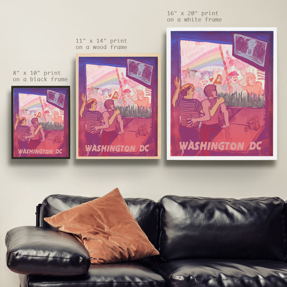 a living room with a couch and two posters on the wall